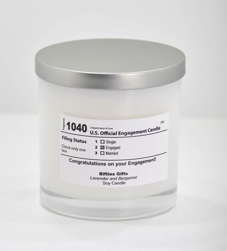 A white candle with a silver lid, labeled as '1040 U.S. Official Engagement Candle. It has an x next to the word "engaged" for someone's filing status. It is a candle for newly engaged couples that looks like an IRS form