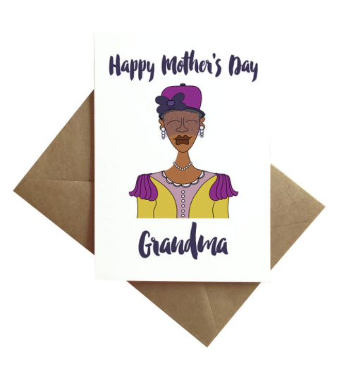 White card with purple text that reads Happy Mother's Day Grandma, with an illustration of an African American woman wearing a purple hat with a veil, pearl necklace and a fancy purple and yellow blouse.